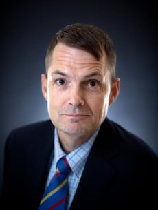 Christopher A. Holland